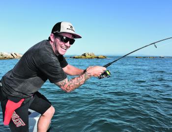 Geordie hooked up to a big fish at Scabbas Reef.