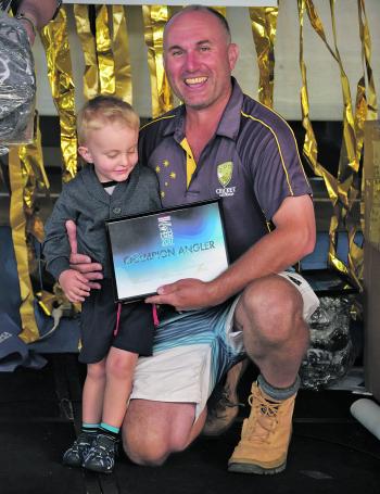 David Fraser took out first place and won a big smile from the little angler next to him.