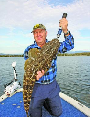 Chris with a solid 93cm flattie from Tuross Lake. This fish took a Squidgy plastic in 2m of water and was released.