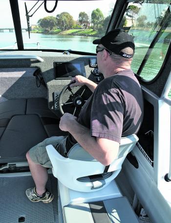 Naturally, the helm is well thought out. You can flush mount mega-sized MFDs and a front-opening side window to allow great airflow. The helm seat has mountains of storage underneath.