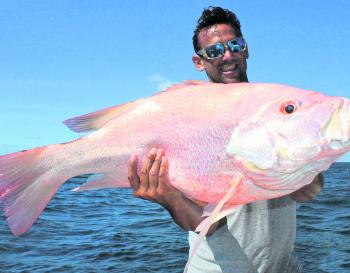 Cain with a genuine 10kg large-mouth nannygai that was pulled from a pinnacle that popped up on the sounder.