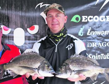 Mario Vukic shows off the 1.37kg and the 1.36kg bream that took out the JML Anglers Alliance Big Bream Prize.
