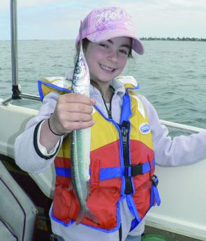 Emma Plastides showing that kids make great catchers of garfish.