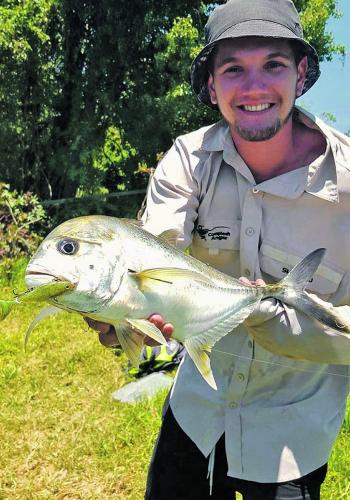 Sam Redman with a solid trevally taken from the upper tidal limit.