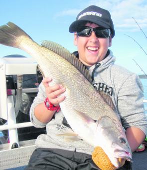 Aleksander Jaime, 12, was totally stoked with the catch and release of his first jewie on a lure. He kept his cool for 30 minutes on 3lb line and the smile says it all.