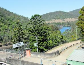 The wall of Somerset Dam – constructed last century in the 1040s and made entirely of concrete.