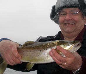 Warren Hicks from Canberra with a brown trout caught on a Tasmanian Devil No 111, Willy’s Special.