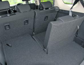 A third row of seating is offered within the LS Outlander; seats being stored under the floor when not in use. 