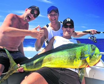 Tom Hawley and his friends with a nice mahimahi caught on a charter with Oceanhunter Sportfishing Charters.