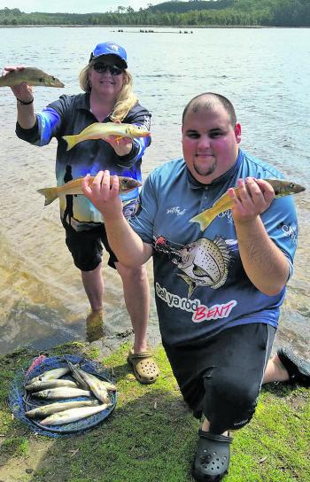 Family fun off the shoreline at Lake Cathie Mandy and Gavin Saxon enjoying an afternoon using poppers for whiting.