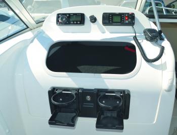 The passenger helm station has a massive dry space for your personal electronics and drinks. Radio and stereo are also mounted this side.