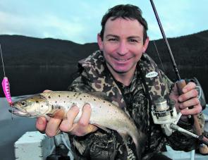 Sandy Hector with a decent Lake Dartmouth rainbow trout caught trolling a Tassie Devil in pink panther colour last winter.