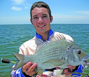 Lee Younan-Wise with a bruising Redcliffe Peninsula bream.