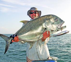 A just above average size Whitsundays GT caught on a Nomad Ulua stickbait around a reef edge.