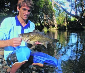 Mitch Green with a bass that will soon have a front row seat at the 2014 Rally Australia WRC round.