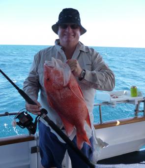 John Clarke with a red emperor caught on running sinker rig. Ball sinkers are often used on deep water spin reel outfits where casting may come into play, such as to get the line away from the boat at anchor. Note that the big ball sinker runs all the way