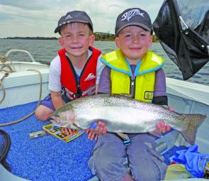 Zach and Will Stevens with their 2.5kg Lake Bolac rainbow trout on an Ecogear SX40.