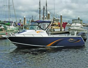 The Yellowfin 6700C on a busy Gladstone harbour. This ruggedly handsome boat is sure to appeal to hard-core fishos.