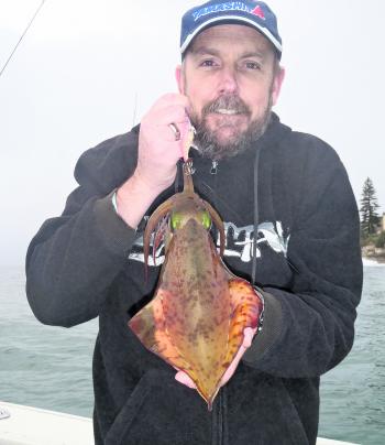 John from Fergos Tackle at Taren Point just loves his squid. So much so, that he releases all of his larger specimens.