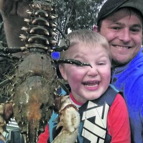 Matt Hooper and his young boy Cody with a decent cray earlier this year.