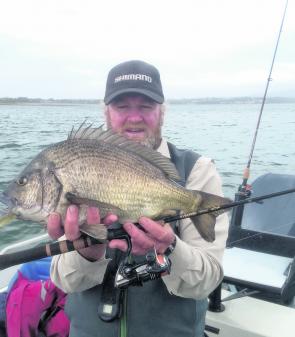 Local guru Michael Hayley with one of the biggest bream you will ever see – a 50cm model taken on a soft plastic.