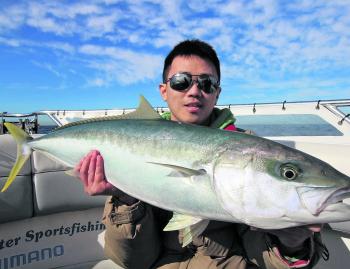 Lin Yidhuo with a great kingfish from The Peak.