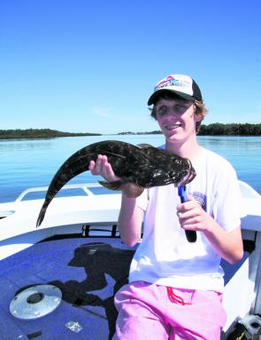 Young gun Zac Mason displays a quality Port Stephens flathead taken on a soft plastic. Early morning or late afternoon is the go.