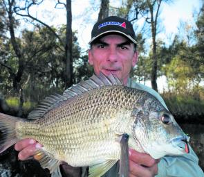 Bream may be difficult to tempt with lures at this time of year but there are some bigger fish around. The author took this beast on a small black blade.