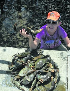 Christina Manly with a feed of muddies taken from a local creek.