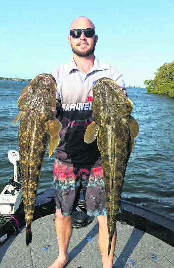 Jake Stewart with two quality Richmond River flathead taken up from Burns Point Ferry.