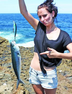 Salmon are abundant off the rocks and beaches. Nyomi Dawson with one on spin tackle. Who knew fishing was a fashion parade?