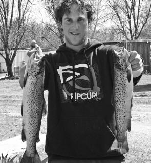 Ryan Crampin with two lovely trout he caught on a drifted scrubworm. The spring trout fishing at Khancoban looks like being the best in years.