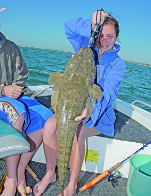 Shelley Christie with a good lizard on soft plastic. May is the first month of the year where you can seriously begin to target flathead on soft plastics.