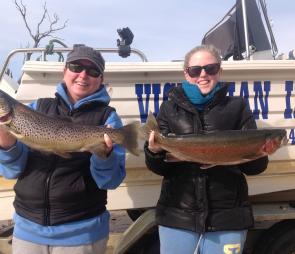Girls day out! Nat Weaver (left) and Kass Baker each landed a great trout on Strike Pro Bob N Spoons in the dark red color at Toolondo.