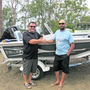 Brad Richey, the owner of Bluefin was on site to congratulate Ashley Scott, the senior lucky draw winner, as the new owner of the Bluefin Tournament Drifter, powered by a Mercury 40hp 4-stroke, on a Dunbier trailer.