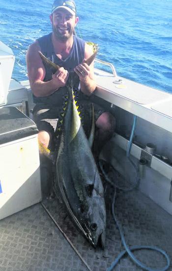 Mark De Jong found his first yellowfin and it definitely put a smile on his face.
