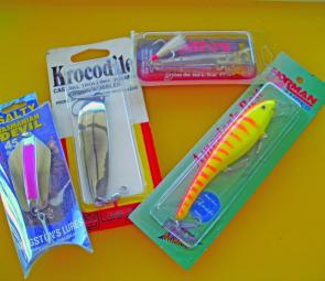 A selection of tailor lures: Spitfire Poppers, Norman Minnows and some chromed metal.