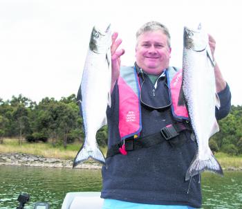 The author with two respectable Chinook salmon caught recently at Lake Bullen Merri working Black Magic B Max minnows in white.