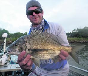 Ben Shuey with a pig bream taken on a hardbodied lure off the first island.