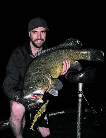 Brad Triffitt with a slab of Blowering cod that was the only fish for a long night casting.