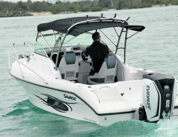 Many of the important features of the big Savage walkaround can be seen here. Note the lift out transom back rests, the large high backed pedestal seats for skipper and mate, plus the width of the walkaround area. 