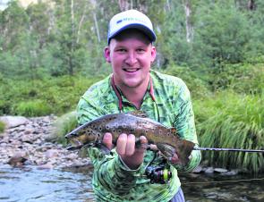 Brenton Richardson with a ripper brown trout caught in the Kiewa River on a Strike Tiger 1