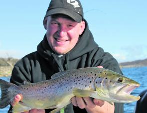 A ripper of a brown trout caught at Lake Eucumbene trolling a large 9cm Rapala Husky Jerk minnow. Using larger minnows like this will also work well in Lake Dartmouth and Khancoban pondage. Don't be afraid to upsize your lures during winter.