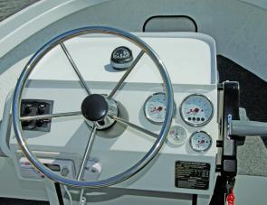 Steering wheel, switches and all gauges are handy to the driver.