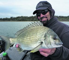 Gez Hawthorne with a horse yellowfin bream, bladed up in the lake.