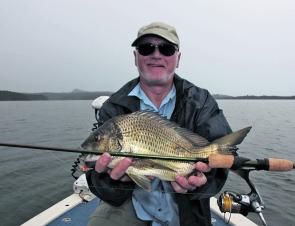 Stuie Fagan caught this solid 41cm bream on a hard-bod in bleak conditions and released it after the photo.