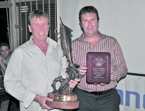 Ross Smith and Solitary Islands Game Fishing Club president James McGinty with the beautiful Bodo Muche Grand Champion Boat trophy.
