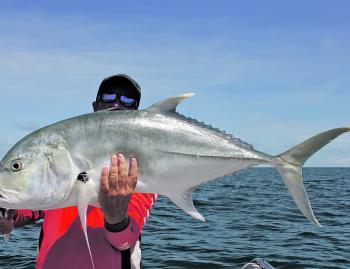 Mark Bargenquast with a big brassy around 12-14kg that smashed a big saltwater Chug Bug Popper.