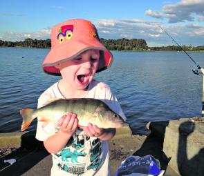 Reilly Maslin, also three years old, was impressed with this fine redfin caught in Canberra’s Lake Ginninderra, with a little help from Dad.