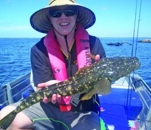 Dwayne Nielsen with a ripper flathead caught and released on an Ecogear sx40.